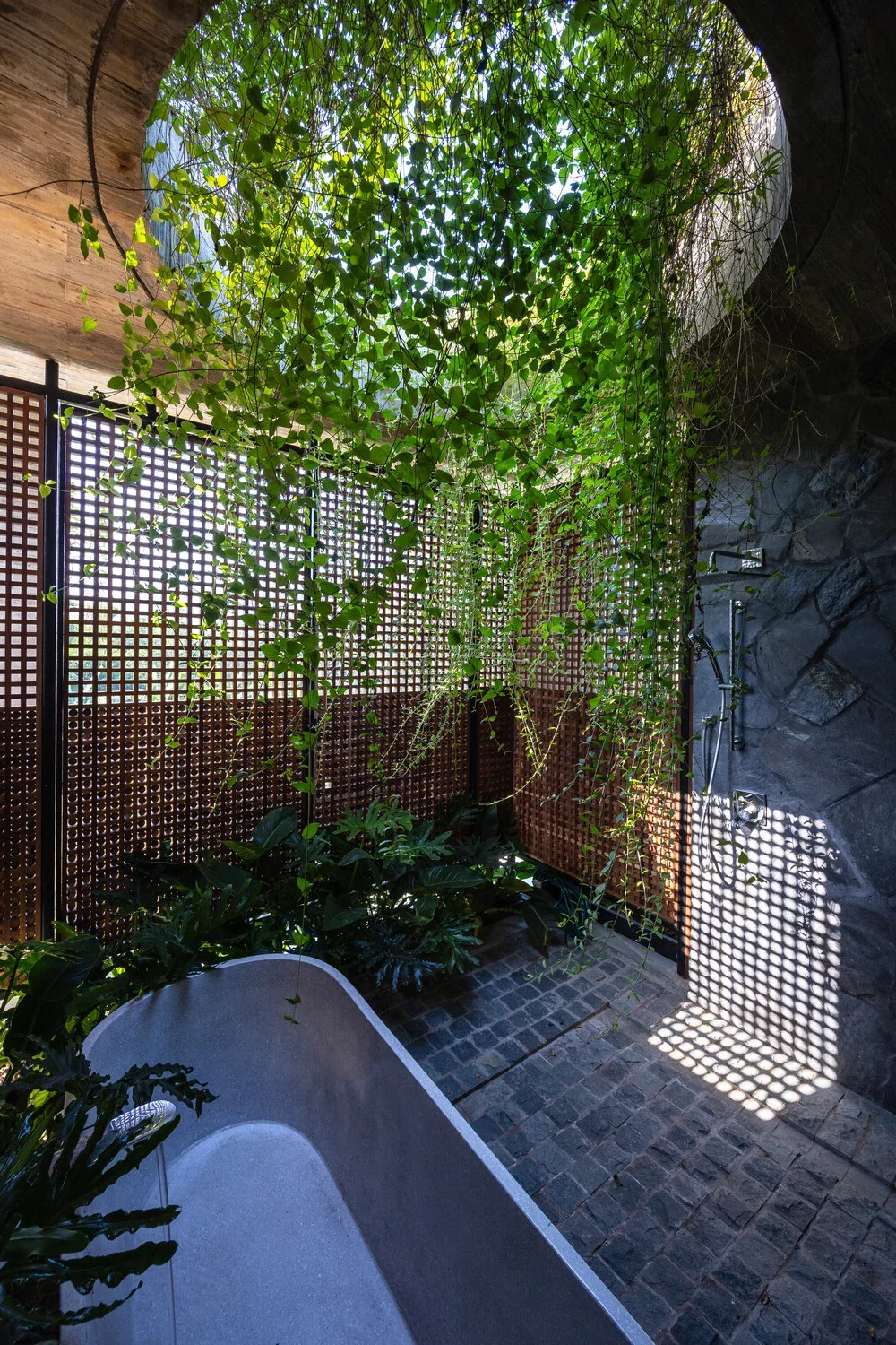 Dora Villa: Sustainable Raw Concrete Architecture Filled with Natural Light