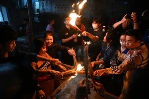 The Sacred Fire Ritual: Discovering Vietnam’s Unique New Year Custom of Taking Red - image 3