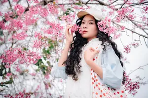 Experience Dalat Cherry Blossoms: Where nature meets wind turbines, an unforgettable photo spot! - image 1
