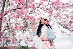 Experience Dalat Cherry Blossoms: Where nature meets wind turbines, an unforgettable photo spot! - image 5
