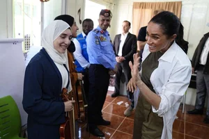 Prince Harry and Meghan Markle Make Surprise Appearance in Jordan - image 9