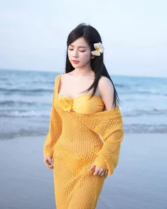 DJ Mie Rocks the Trendy Fishnet Dress Look for Beach Fashion - image 2
