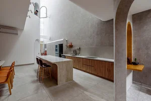Stunning 200-Square-Meter Townhouse Inspired by Mountain Light Clefts - image 3
