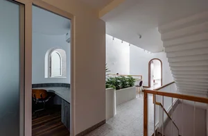 Stunning 200-Square-Meter Townhouse Inspired by Mountain Light Clefts - image 13