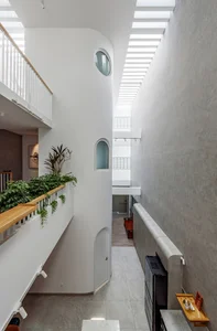 Stunning 200-Square-Meter Townhouse Inspired by Mountain Light Clefts - image 7