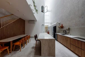 Stunning 200-Square-Meter Townhouse Inspired by Mountain Light Clefts - image 9
