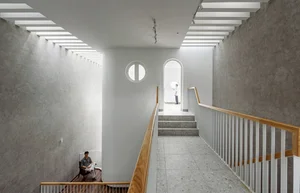 Stunning 200-Square-Meter Townhouse Inspired by Mountain Light Clefts - image 0