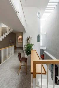Stunning 200-Square-Meter Townhouse Inspired by Mountain Light Clefts - image 10