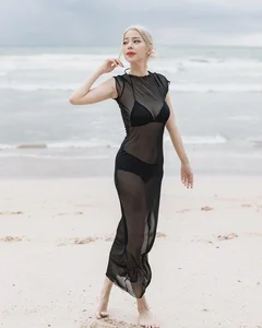 Sheer and Crochet Dresses Over Bikinis: The Hottest Summer Trend - image 2