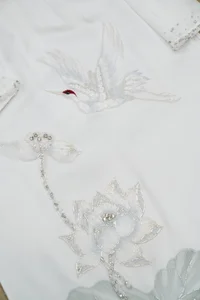 Inside Doan Van Hau and Doan Hai My's Exquisite Custom Wedding Ao Dai - image 1