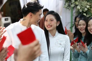 Inside Doan Van Hau and Doan Hai My's Exquisite Custom Wedding Ao Dai - image 10