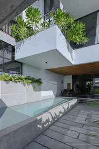 Eco-Friendly House Design: Staying Cool with Skylights and Green Balconies - image 1