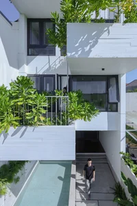 Eco-Friendly House Design: Staying Cool with Skylights and Green Balconies - image 6