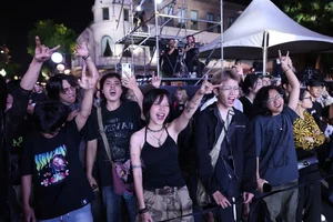 Experience Hanoi Like a Local: From Nostalgic Morning Festivals to High-Energy Night Concerts - image 3