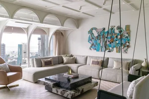 Duplex Living Redefined: A Two-Story Apartment of Contrasting Identities - image 11