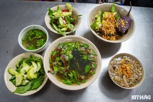 Tiny 20sqm Hanoi Eel Noodle Shop Earns Michelin Recognition - image 9