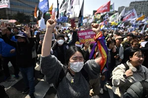 Mixed Public Emotions Following Historic Impeachment of South Korean President - image 5