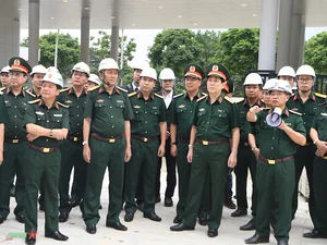 General Luong Cuong Inspects Progress of the New Vietnam Military History Museum - image 1