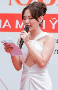 Luong Thuy Linh Steals the Spotlight in Plunging Red Carpet Gown - image 7