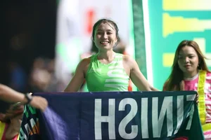 Ethiopian Athlete and Hong Le Triumph at HCMC Night Run - image 13