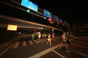 Ethiopian Athlete and Hong Le Triumph at HCMC Night Run - image 11