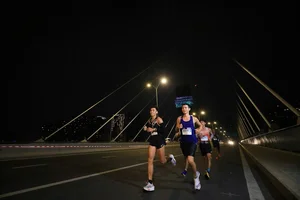 Ethiopian Athlete and Hong Le Triumph at HCMC Night Run - image 10