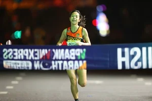 Ethiopian Athlete and Hong Le Triumph at HCMC Night Run - image 4