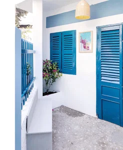 Budget 17m2 Alley House Renovation in Binh Thanh with Santorini Style - image 0