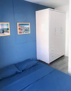 Budget 17m2 Alley House Renovation in Binh Thanh with Santorini Style - image 11