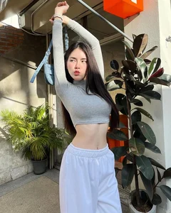 Bold Street Style: Beautiful Influencer Turns Heads Wearing Chic Lingerie-Inspired Fashion Outdoors - image 8