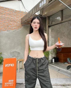 Bold Street Style: Beautiful Influencer Turns Heads Wearing Chic Lingerie-Inspired Fashion Outdoors - image 9