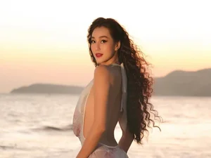 Khanh My Flaunts Hourglass Curves in Bold Bikini and Mesh Dress Combo - image 3