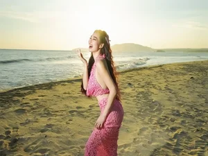 Khanh My Flaunts Hourglass Curves in Bold Bikini and Mesh Dress Combo - image 2