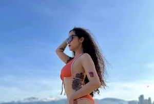 Actress Thuy Duong: The 'Miss of Theater' with Bold Tattoos and Charismatic Style - image 0