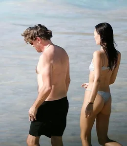 Famous Model Spotted in Chic Bikini During Romantic Beach Getaway - image 5