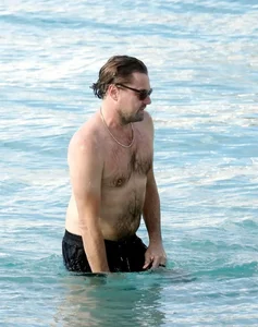 Famous Model Spotted in Chic Bikini During Romantic Beach Getaway - image 7