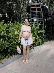 Joyce Pham Redefines Maternity Beach Style - image 4