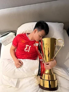 Vietnam Players 'Flex' as They Sleep with the Championship Trophy - image 4