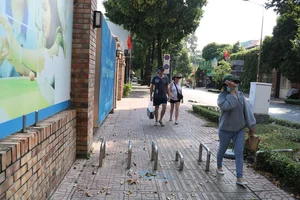 Ho Chi Minh City Removes Motorbike Sidewalk Barriers After 8-Year Traffic Experiment - image 0
