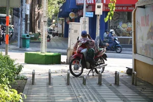 Ho Chi Minh City Removes Motorbike Sidewalk Barriers After 8-Year Traffic Experiment - image 3