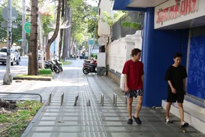 Ho Chi Minh City Removes Motorbike Sidewalk Barriers After 8-Year Traffic Experiment - image 4
