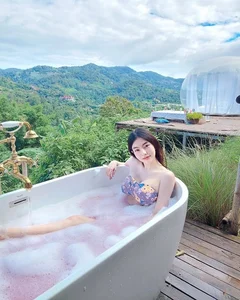Stunning Beauty and Elegance: A Captivating Bathtub Portrait Gallery Exploring Modern Self-Care Aesthetics - image 7
