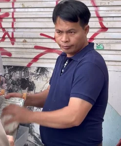 The Mystery of Hanoi’s Viral Street Food Vendor: A Story Beyond the Shifty Gaze - image 4