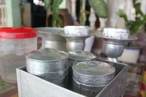 Discover the Unique Traditional Silver Carving Art of the Cham People in Khanh Hoa - image 2