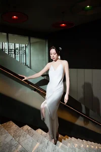 Miss To Diep Ha Steals the Spotlight in an Elegant White Silk Red Carpet Dress - image 2