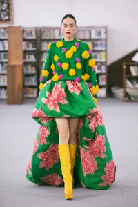 Supermodel Vo Hoang Yen Walks Catwalk Holding Her Baby - image 0