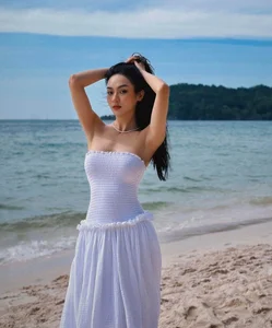 Elegant Fashion Inspiration: Runner-Up Vu Thuy Quynh's Figure-Flattering Outfits - image 2