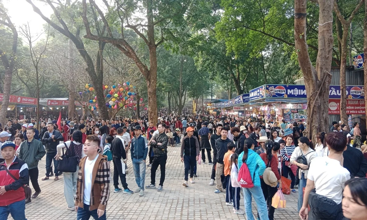 Experience the Vibrant Energy and Massive Crowds at Huong Pagoda and Yen Tu Mountain During Vietnam's Lunar New Year Tet Festival Celebrations