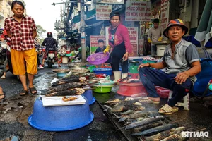 God of Wealth Day Food Traditions: Grilled Fish and Roast Duck in Ho Chi Minh City - image 12