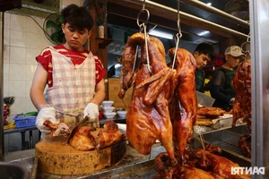 God of Wealth Day Food Traditions: Grilled Fish and Roast Duck in Ho Chi Minh City - image 11
